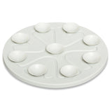 10 suction cups on the bottom of the feeder secure it in place while in use.  Dishwasher safe. 