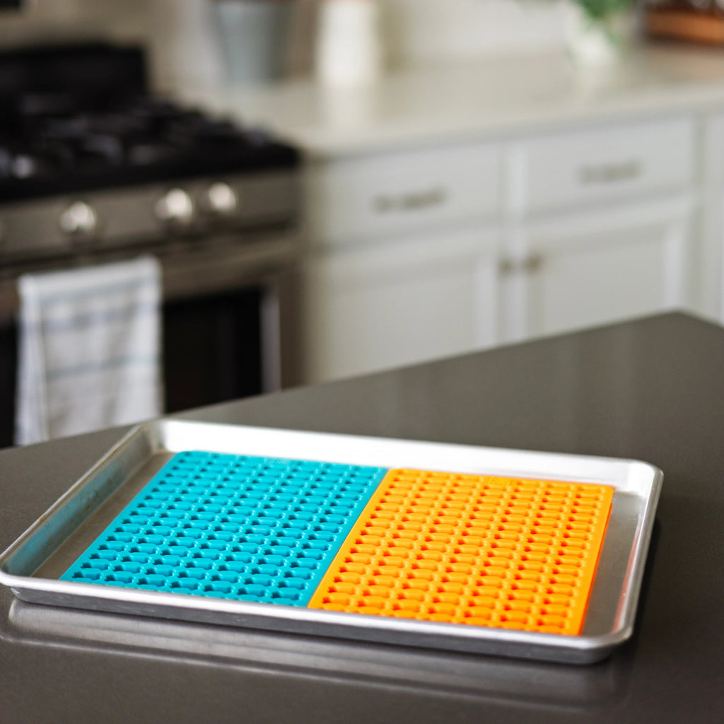 Bake or freeze mini treat molds on a baking sheet.