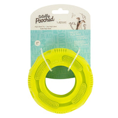 Green tire dog toy in packaging. 