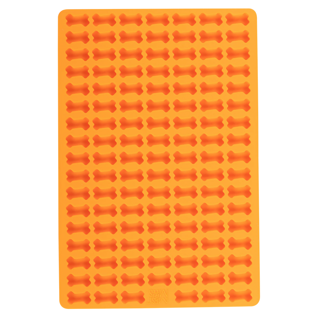 Orange mini bake and feexe dog reat mold.  .4 oz capacity