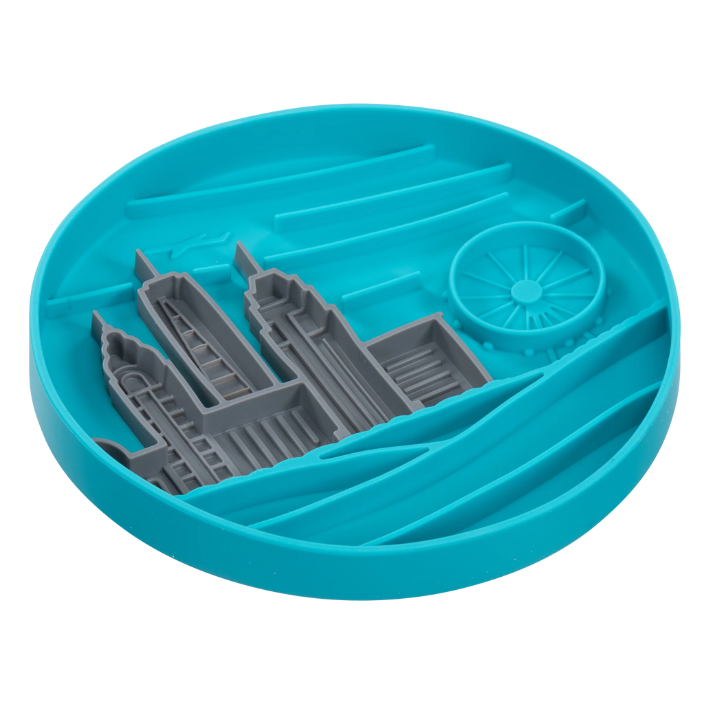 Blue silicone mold with gray city designs for dog enrichment feeding