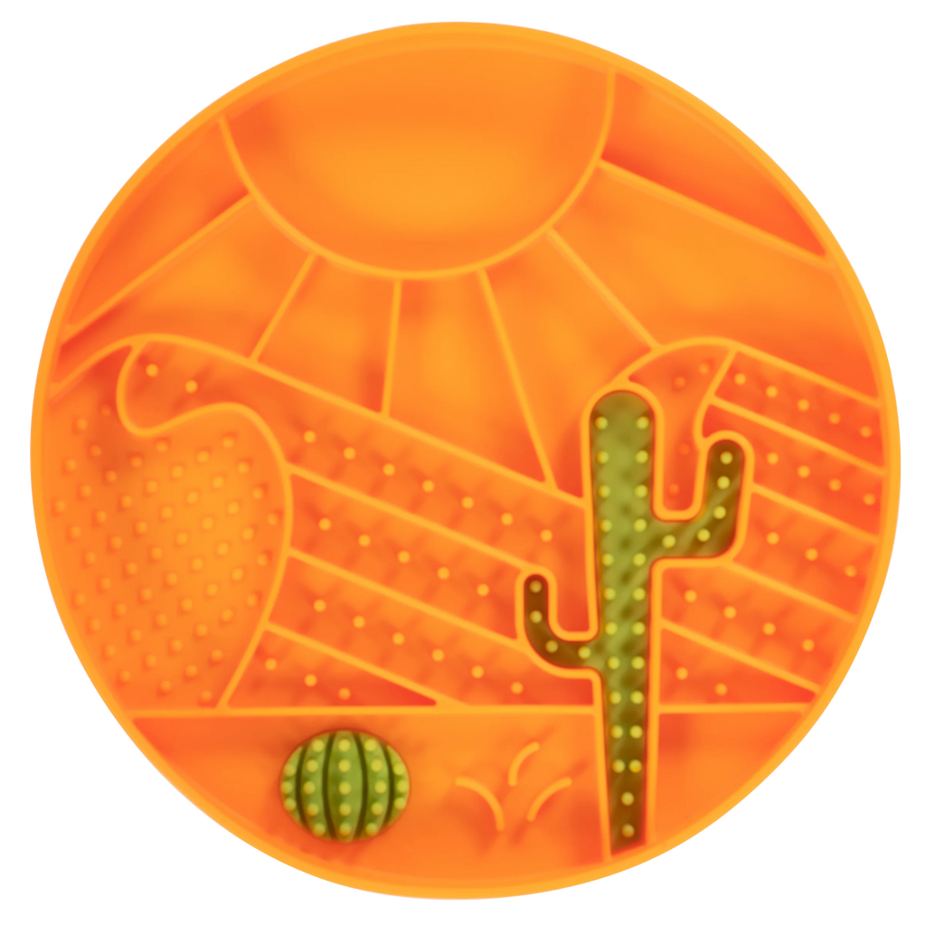 Round orange dog slow feeder with desert-themed design including a cactus and sand patterns. Integrated suction cups as ell to hold the bowl in place while pets are eating.