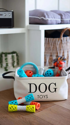 Basket of colourful dog toys.  Great for disopensing treats and squeaking for interactive play. 