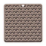 Grey cat lick mat.  Interactive cat feeder to promote licking and prolonging eating.  