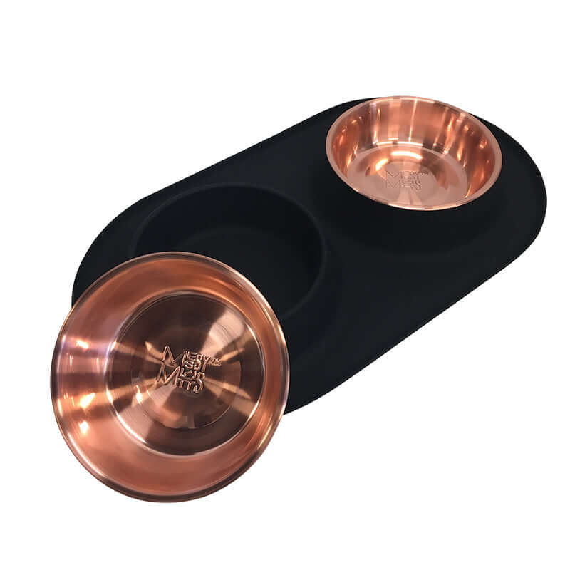 Black double dog feeder with removable copper colored bowls. 