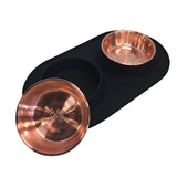 Removable stainless steel bowls that are copper coloured in the black double dog feeder.