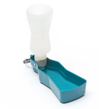Blue travel dog water bottle with flip up design,  flat bottom to stand on its own. 
