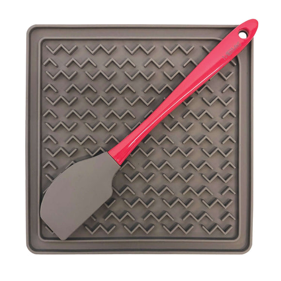 Silicone Interactive dog lick mat. Spatula include for easy spreading of treat to keep your dog engaged. Enrichment dog feeder.