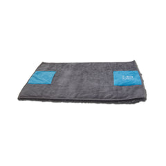 Two built in pockets on the back of the mat too easily hold your dog while drying.  Non slip dog mat. 