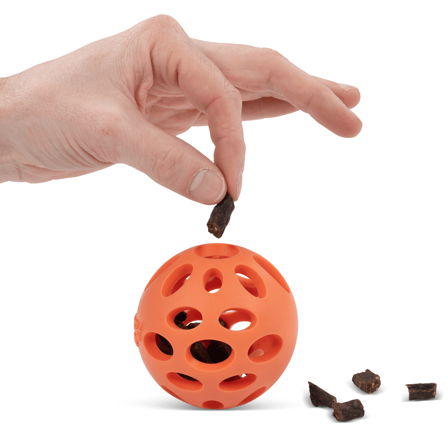 dog ball with holes also allows for treats to fall out when playing.  Perfect for engaging dog play. 