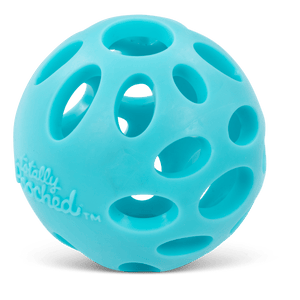 Rubber dog ball outlet with holes